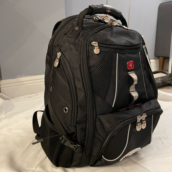 NEW WEGNER BACKPACK; in perfect condition with added silver design in the front! - Picture 2 of 14